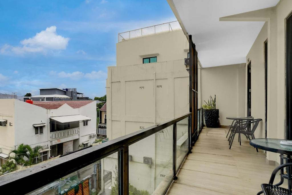 a balcony with a view of a building at Collection O Yayah Residence in Bogor