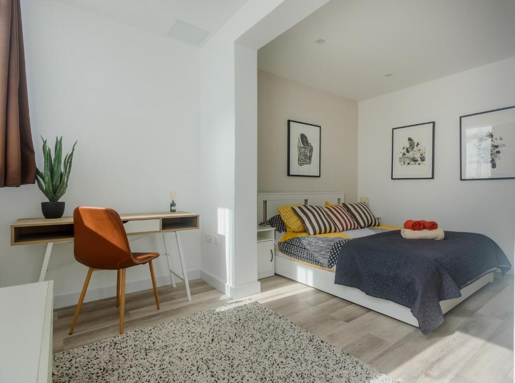 En eller flere senge i et værelse på Sarah's Penthouse in Sliema