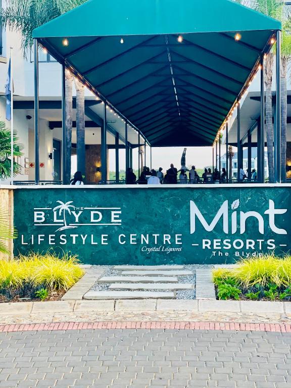 a building with a sign in front of it at The Blyde -Ender137 in Pretoria