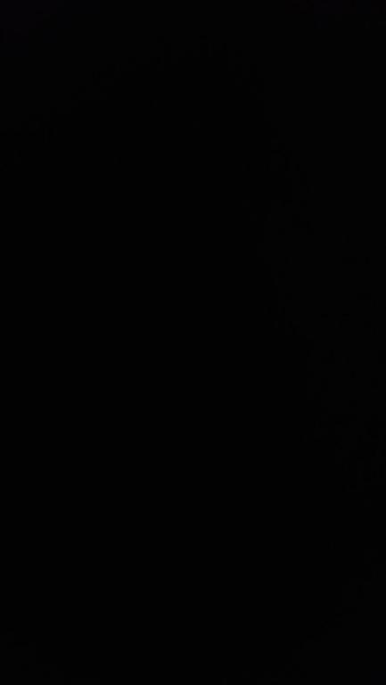 una camera oscura con sfondo nero e candela di oshsus jahsvsb a Al Ain