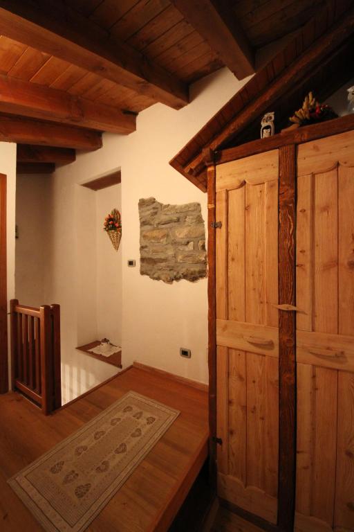 Posteľ alebo postele v izbe v ubytovaní B&B Vecchio Torchio di Bard