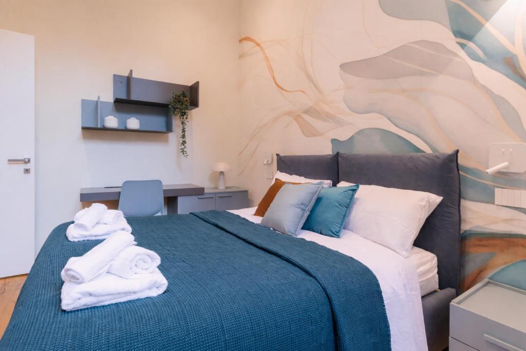 Lagrange Apartments tesisinde bir odada yatak veya yataklar