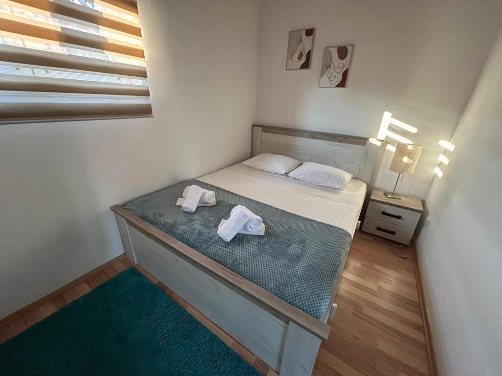 En eller flere senge i et værelse på Apartment 086