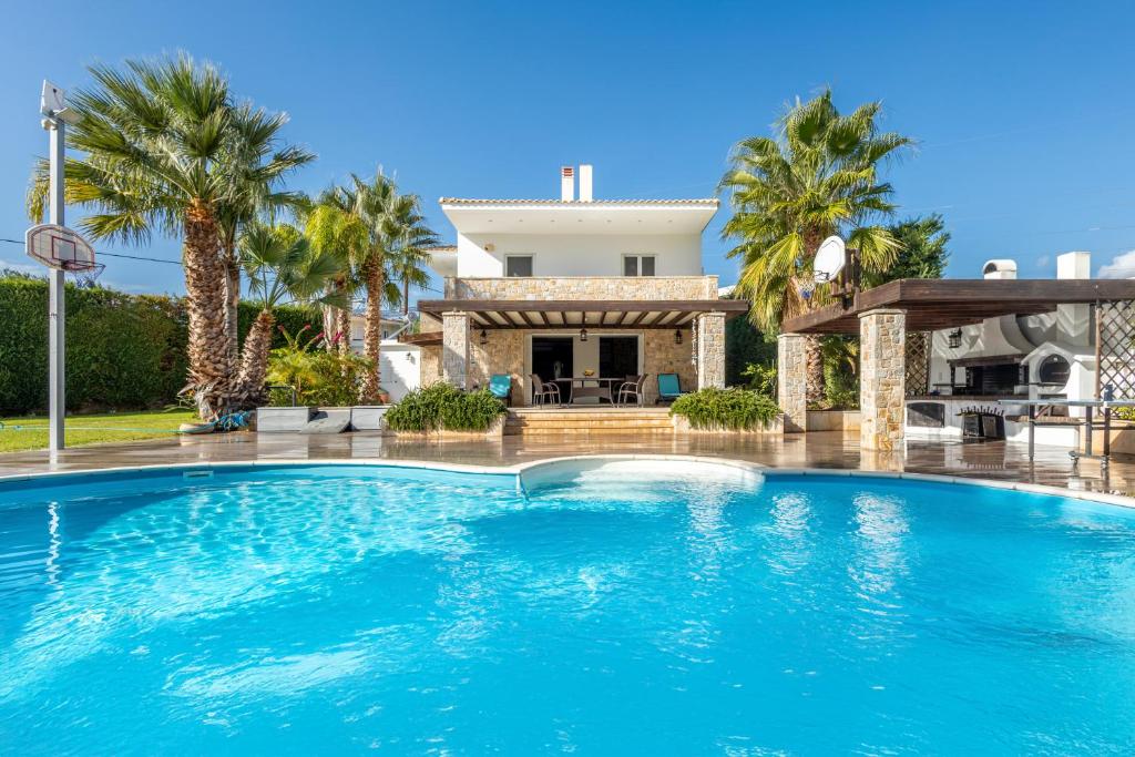 Swimmingpoolen hos eller tæt på Villa Aggeliki