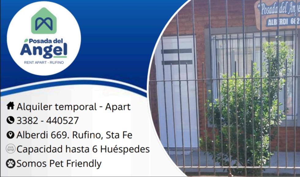 een bord voor een gebouw bij Posada del Ángel in Rufino