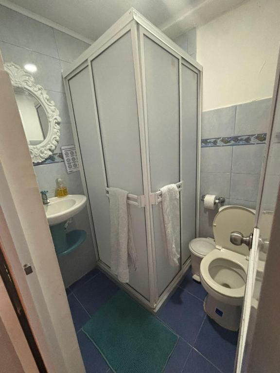 a bathroom with a toilet and a sink at habitacion doble 1 Marcia place in San Andrés