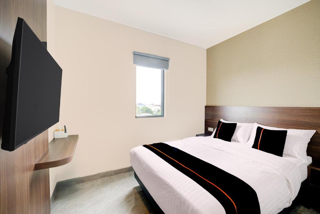 Et tv og/eller underholdning på Townhouse Oak Cengkareng