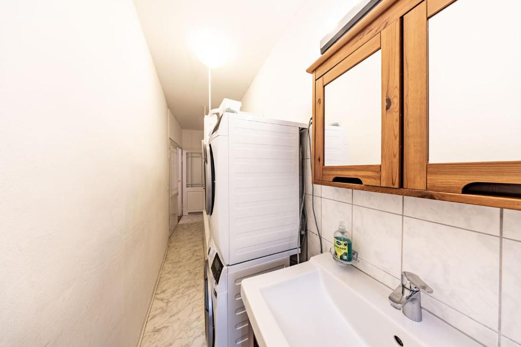 Een badkamer bij The R Apartment Munot - Old Town