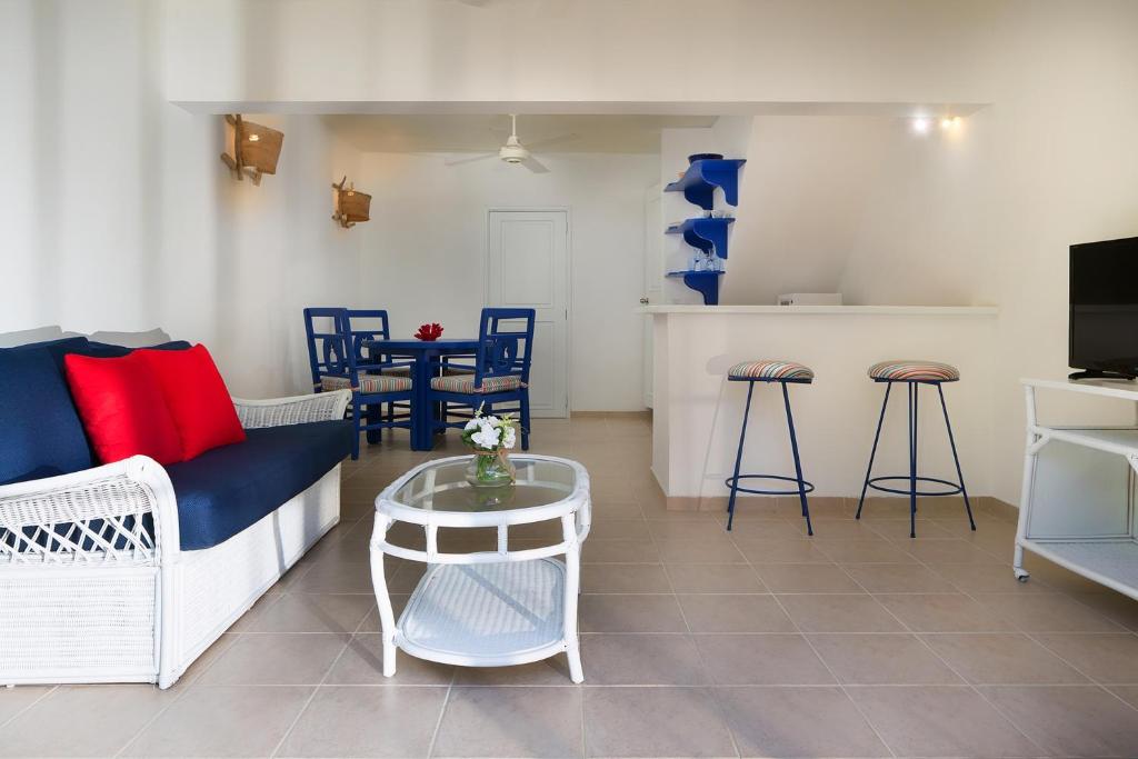 TV a/nebo společenská místnost v ubytování Condo Hotel Playa Las Ballenas