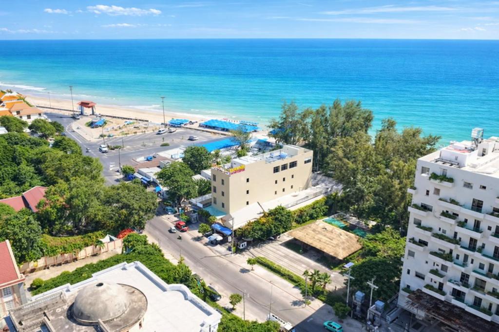 an aerial view of a city and the ocean at Khách Sạn - Cà Phê Dinh Cô in Long Hai