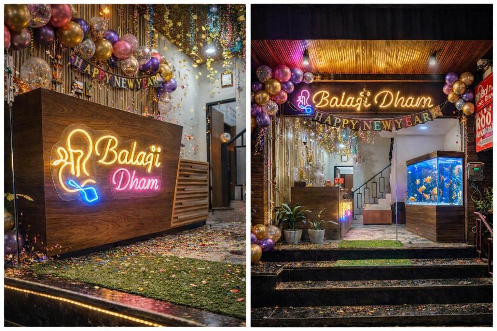 a hall with a sign that reads rb baby lion and balloons at Hotel Shri Balaji Dham, Family Room Near Mathura Railway Station in Mathura