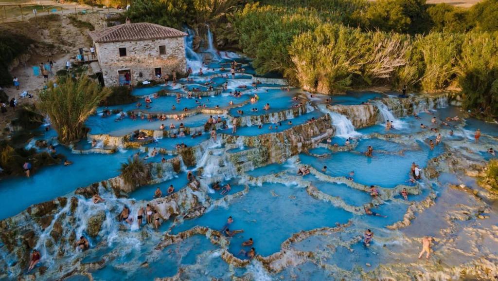 an aerial view of a waterfall at the water park at B & V Home in Montemerano