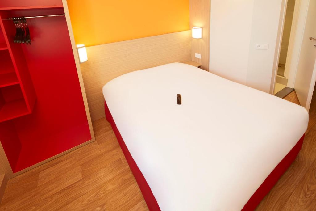 Postel nebo postele na pokoji v ubytování Premiere Classe Valence Nord - Saint Marcel Les Valence