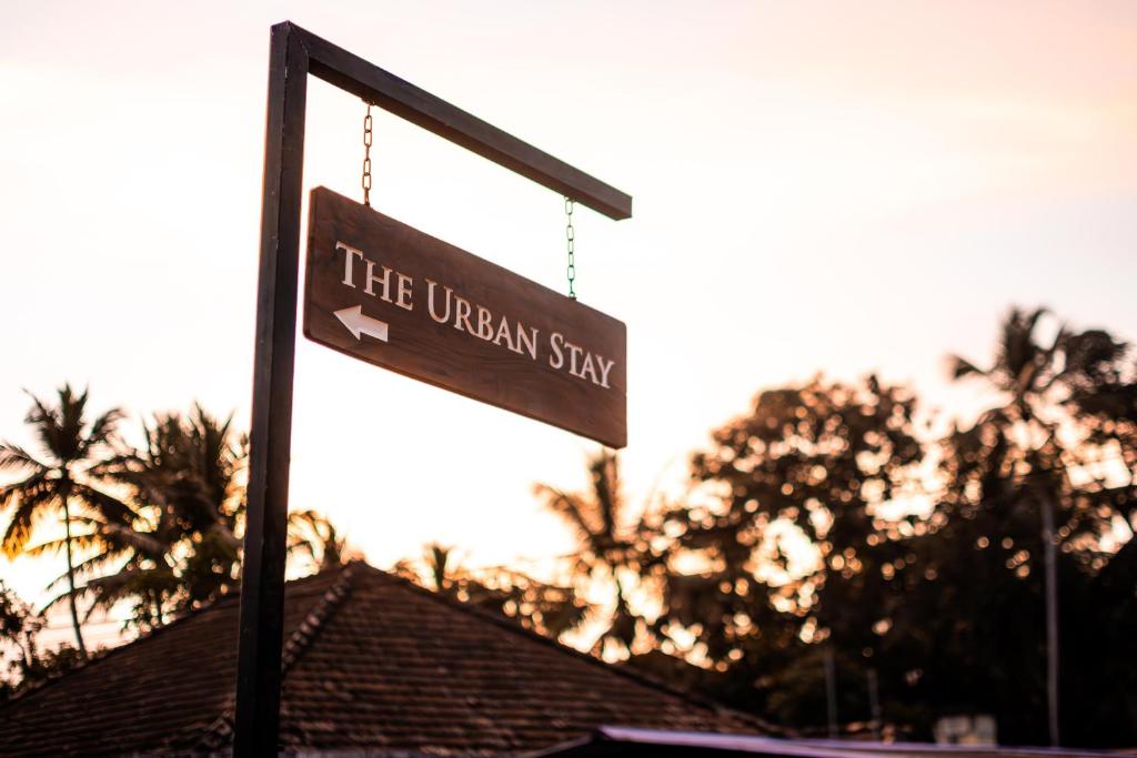 a sign that reads the urban sign in front of a house at The Urban Stay in Galle
