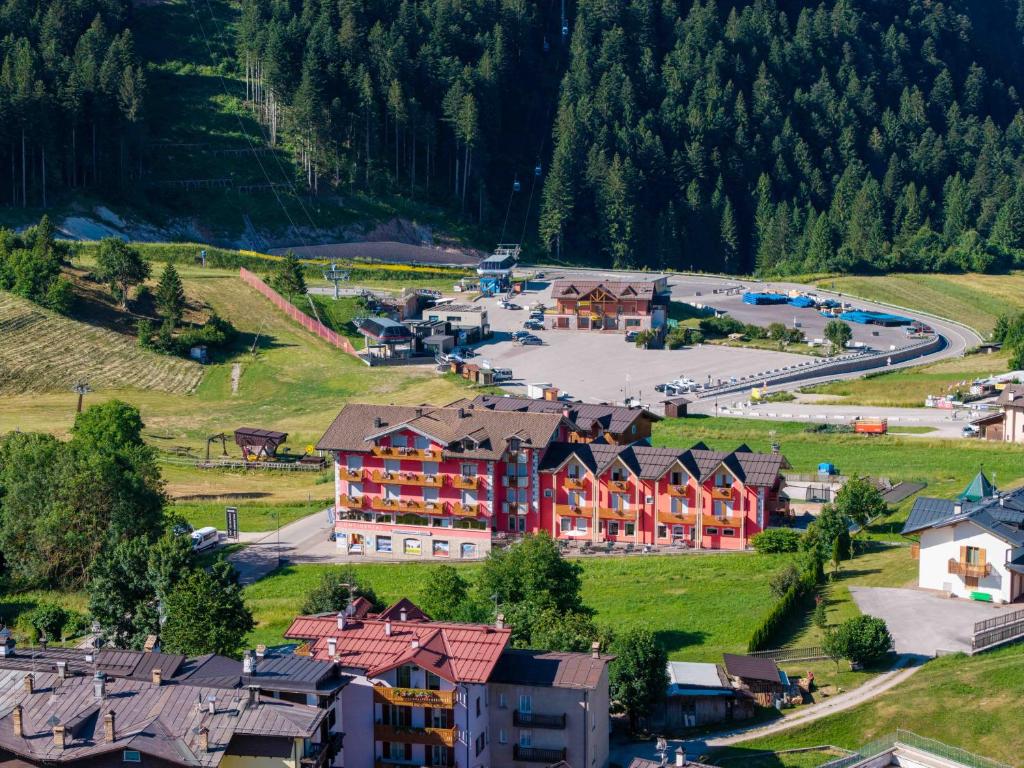 an aerial view of a resort in the mountains at Hotel Continental in Andalo