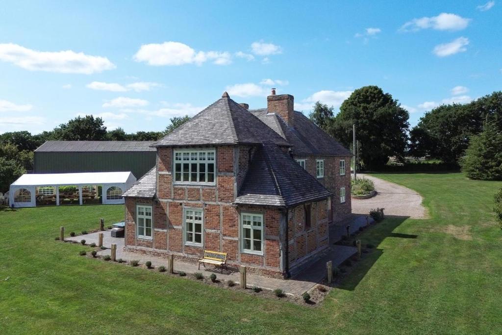 an old brick building in the middle of a field at 1 Bed in Linton oc-s31746 in Linton