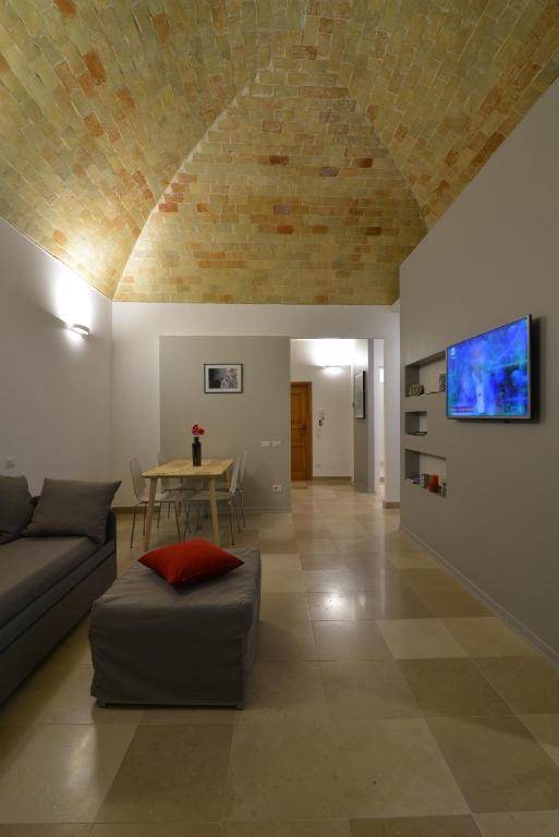 A television and/or entertainment centre at L'Affaccio Dell'Abate