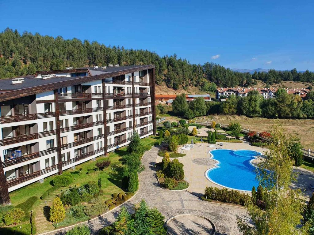 an aerial view of a resort with a swimming pool at AspenValley Aprtment in Razlog