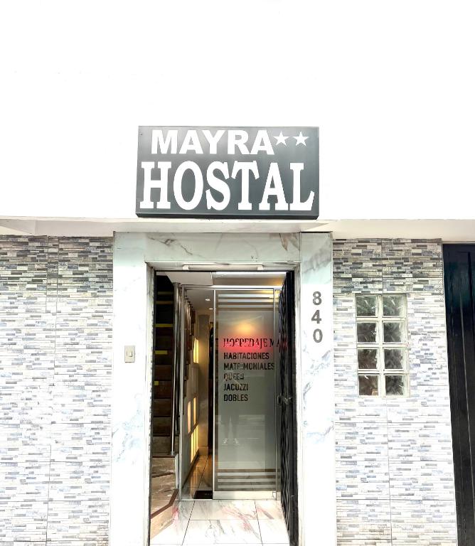 a hospital building with a sign that reads mayray hospital at Hostal Mayra Breña in Lima
