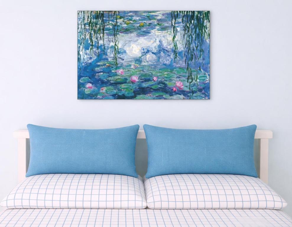 a painting above a bed with two pillows on it at Happy Room Near Citrus College in Glendora