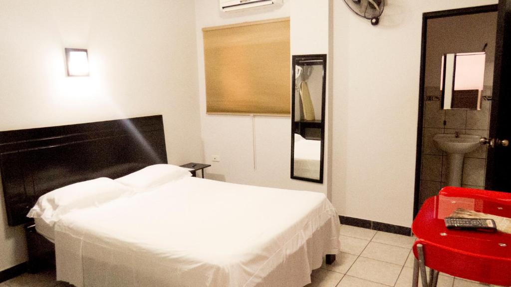 Postel nebo postele na pokoji v ubytování Jer`s Hostal