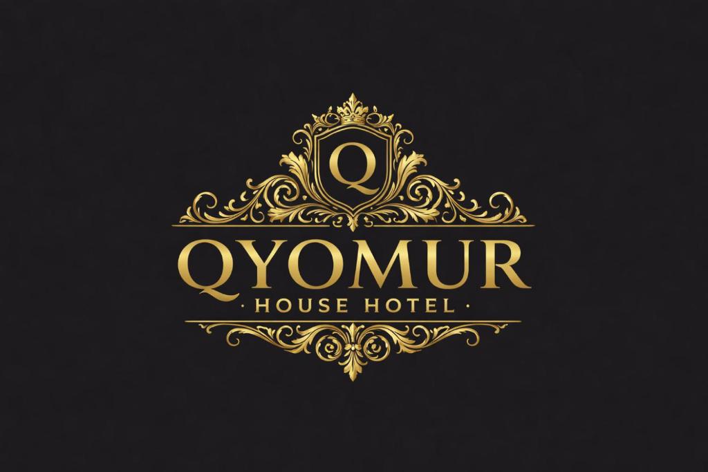 a luxury hotel logo with a golden frame and aigil at Qyomur House in Stepʼanavan
