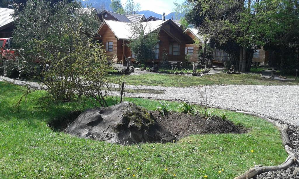 Jardín al aire libre en Cabañas del Español