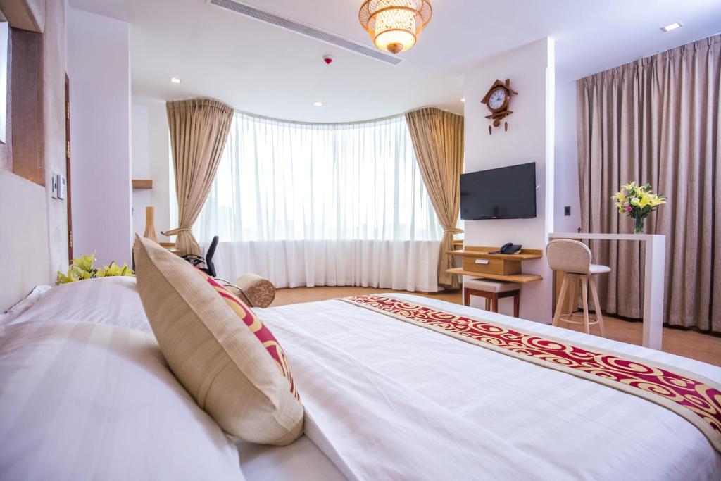 TV a/nebo společenská místnost v ubytování Orussey One Hotel & Apartment
