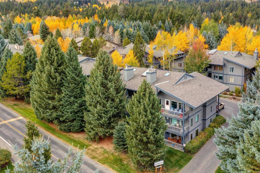 an aerial view of a house with trees at Abode at Rendezvous in Teton Village