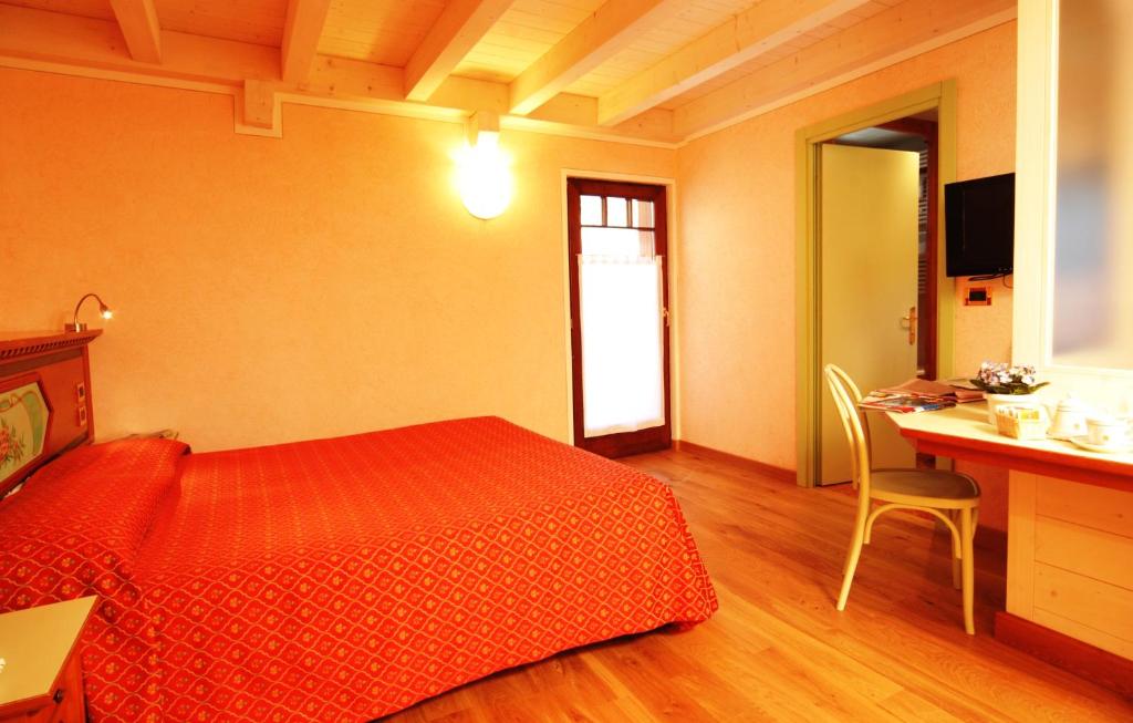 Postel nebo postele na pokoji v ubytování Hotel Ideal