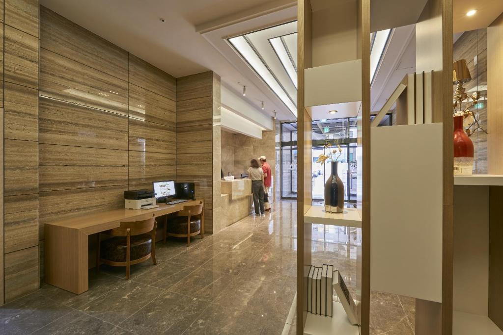 TV a/nebo společenská místnost v ubytování Dubai Hotel