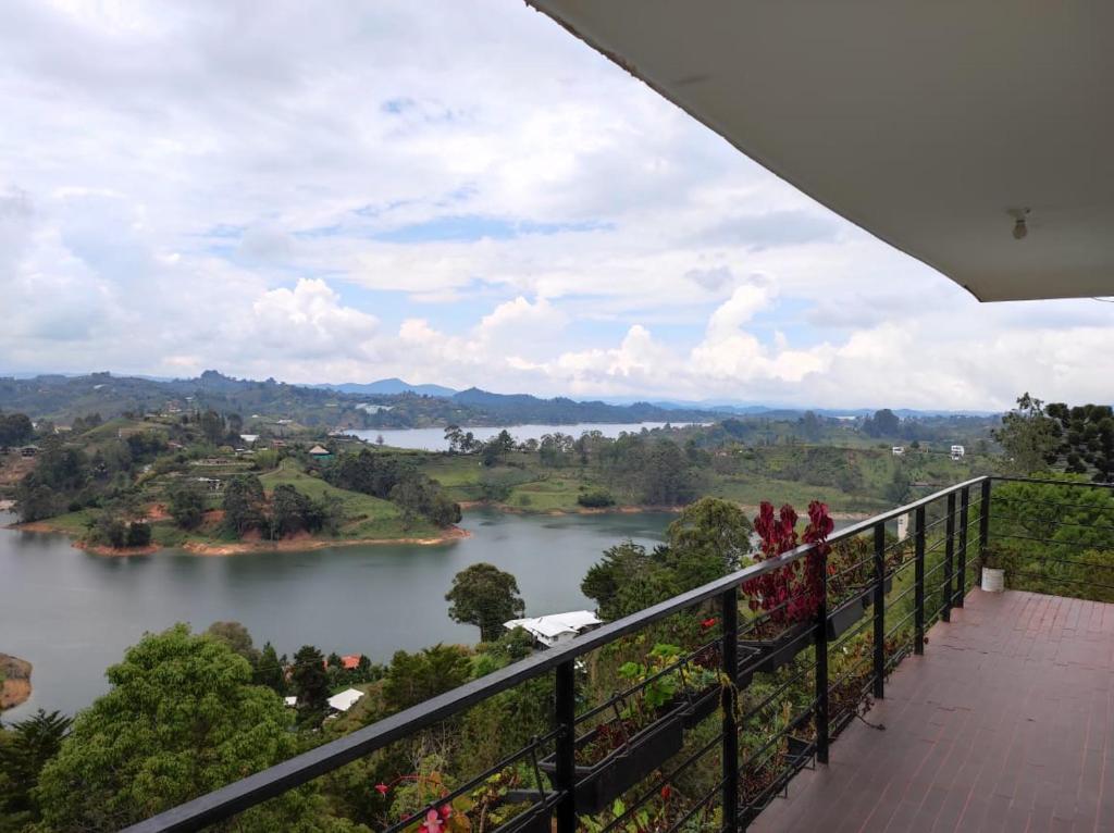 a view of a river from a balcony at Finca Villa Lake in Horizonte