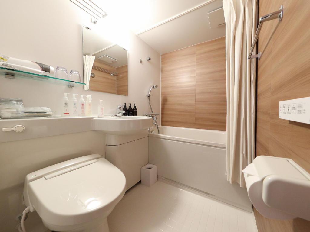 Koupelna v ubytování Hotel Sakura Suite Osaka Juso