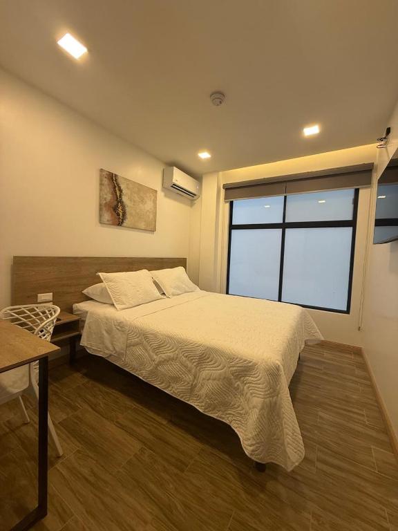 Lova arba lovos apgyvendinimo įstaigoje Kiran Lodging Guayaquil