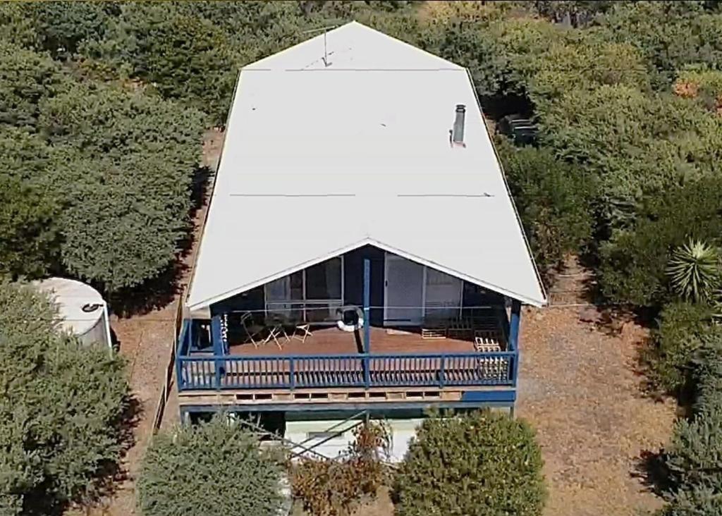 an overhead view of a building with a white roof at La Sirena, Venus Bay in Venus Bay