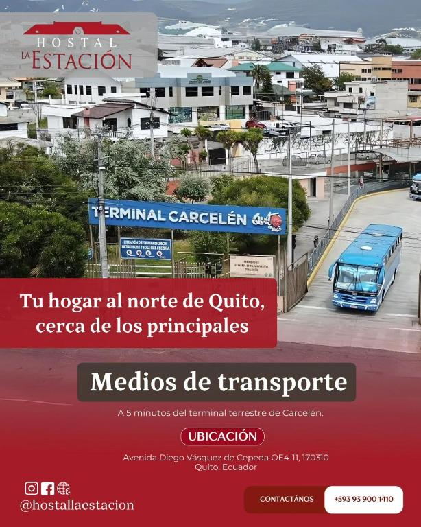 a bus driving down a city street with at Hostal La Estación Quito in Quito
