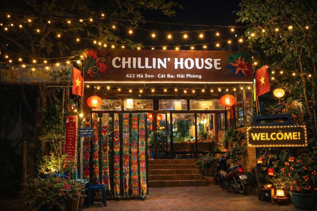 a chilin house with christmas lights and a store at Chillin' House in Cat Ba