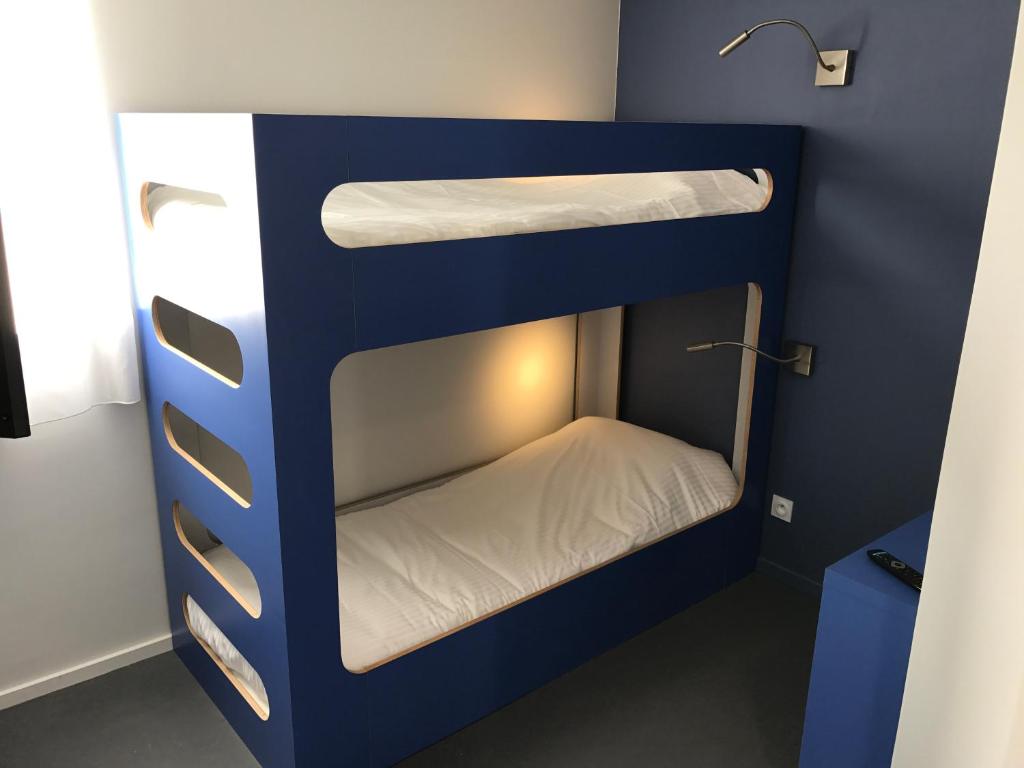 Postel nebo postele na pokoji v ubytování Coto Hotel