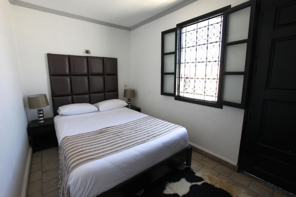 Postel nebo postele na pokoji v ubytování Riad7