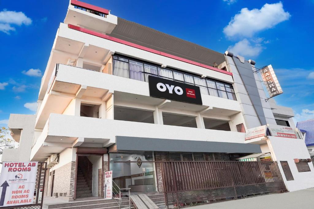 a building with a yeso sign on it at Hotel O AB Rooms in Bareilly