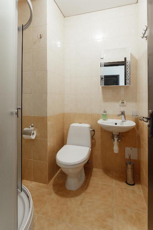Koupelna v ubytování Breeze Hotel
