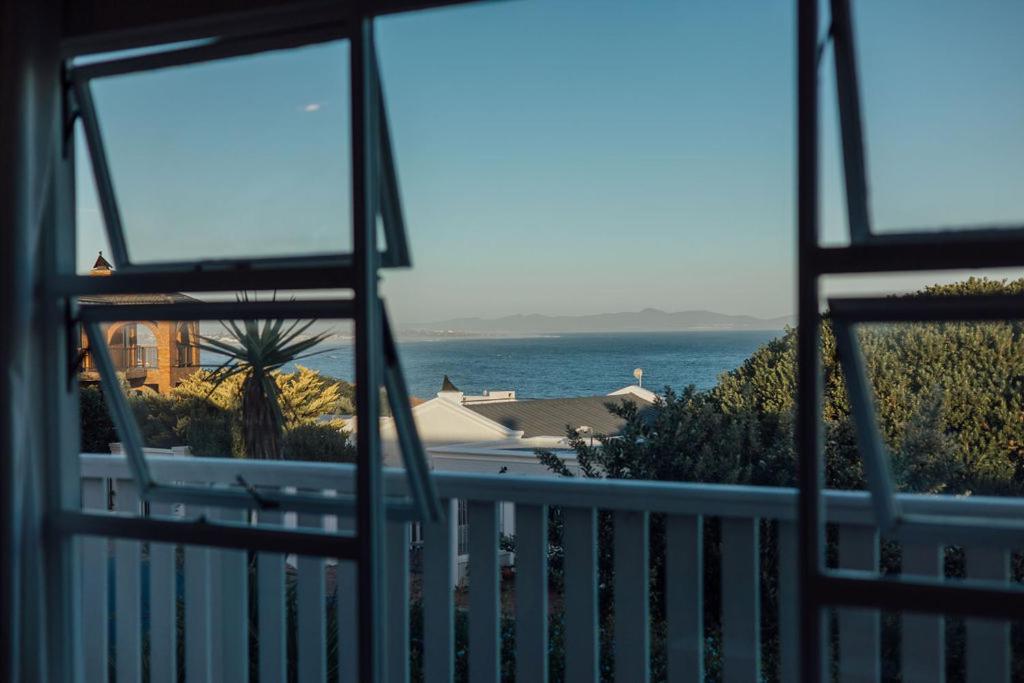 a view of the ocean from a balcony at Seabreeze in Hermanus