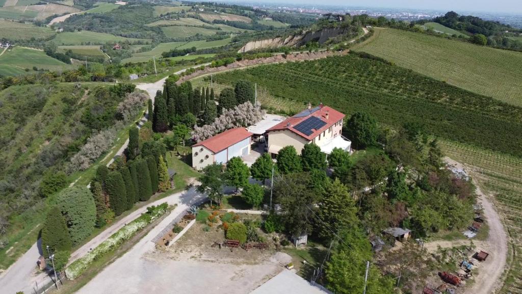 an aerial view of a house in a field at Agriturismo La Querciola in Riolo Terme