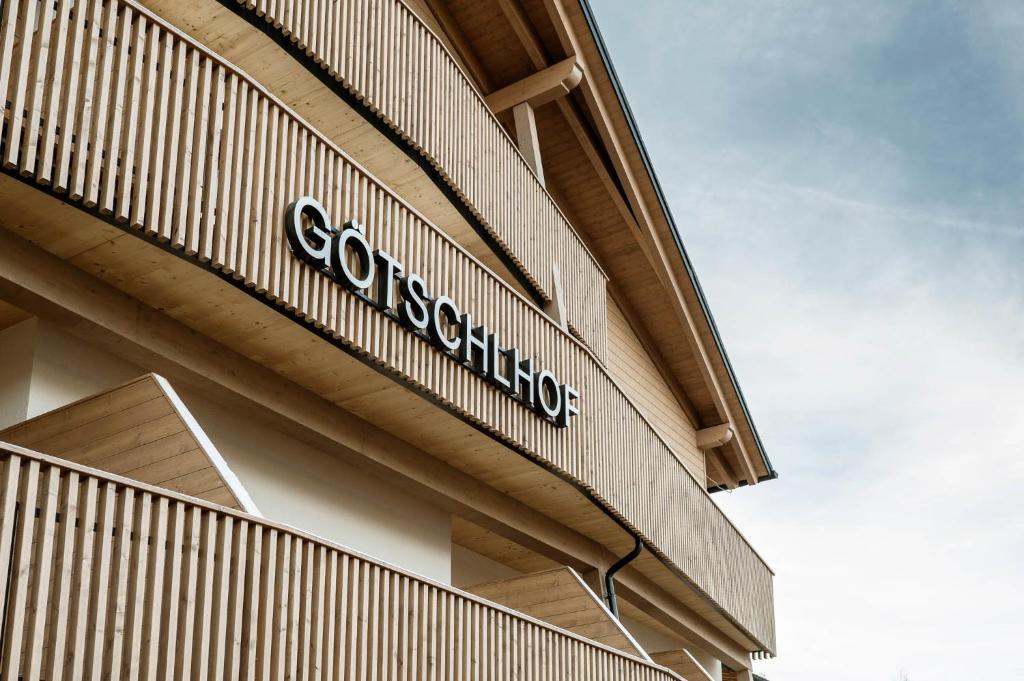 Et logo, certifikat, skilt eller en pris der bliver vist frem på Glücksmoment Götschlhof