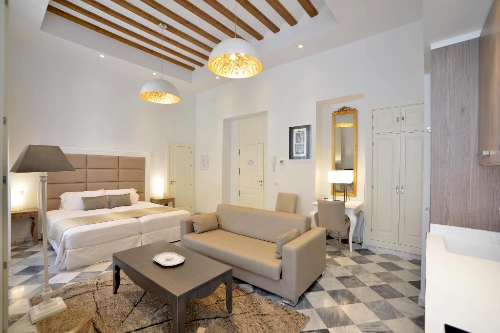 Posezení v ubytování El Armador Casa Palacio by Luxury Suites Cádiz