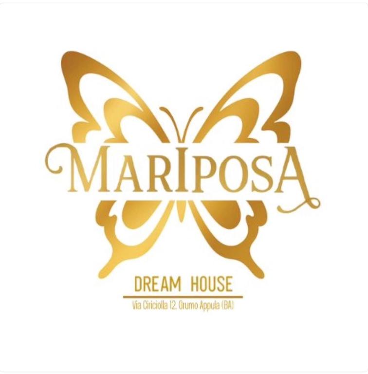 a logo for a dream house with a butterfly at Mariposa Grumo in Grumo Appula