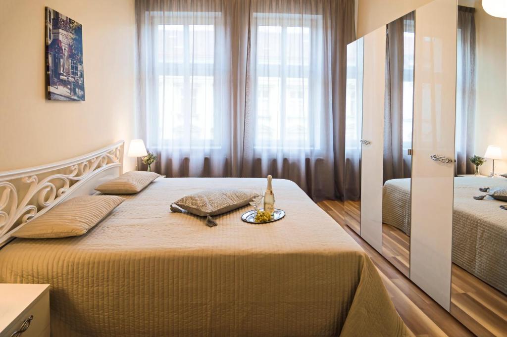 Postel nebo postele na pokoji v ubytování Apartment Za Poricskou branou