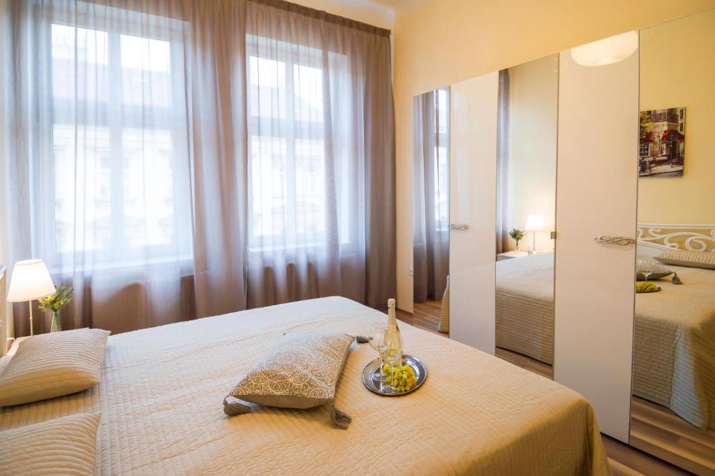 Postel nebo postele na pokoji v ubytování Apartment Za Poricskou branou