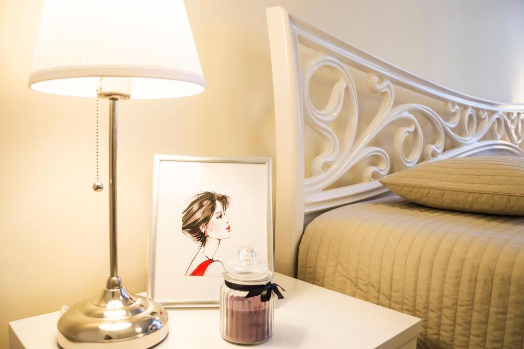 Postel nebo postele na pokoji v ubytování Apartment Za Poricskou branou