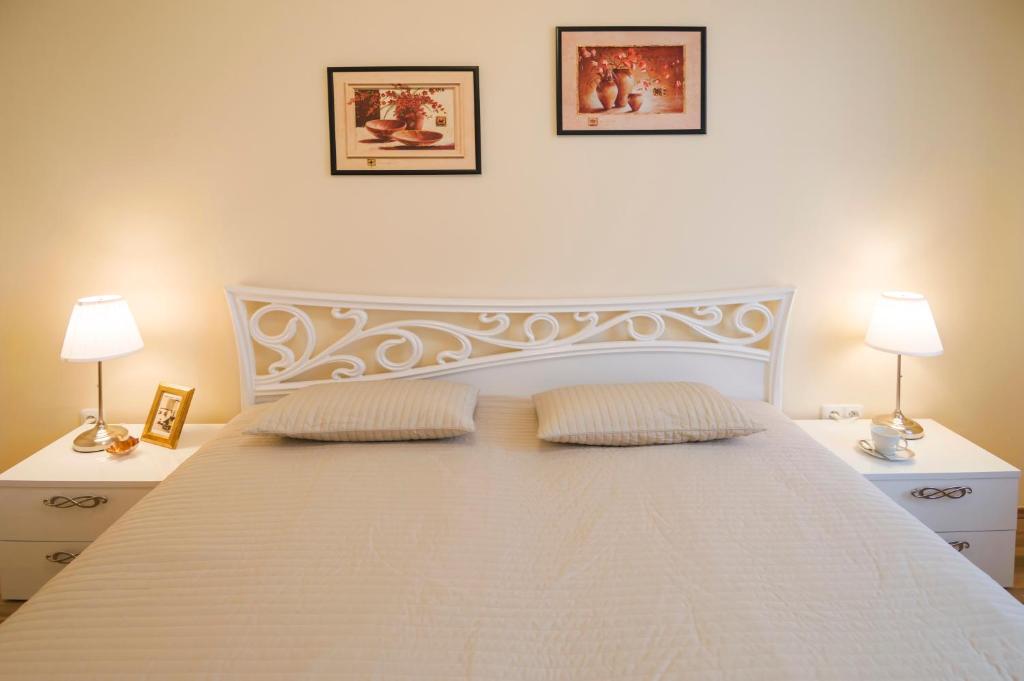 Postel nebo postele na pokoji v ubytování Apartment Za Poricskou branou